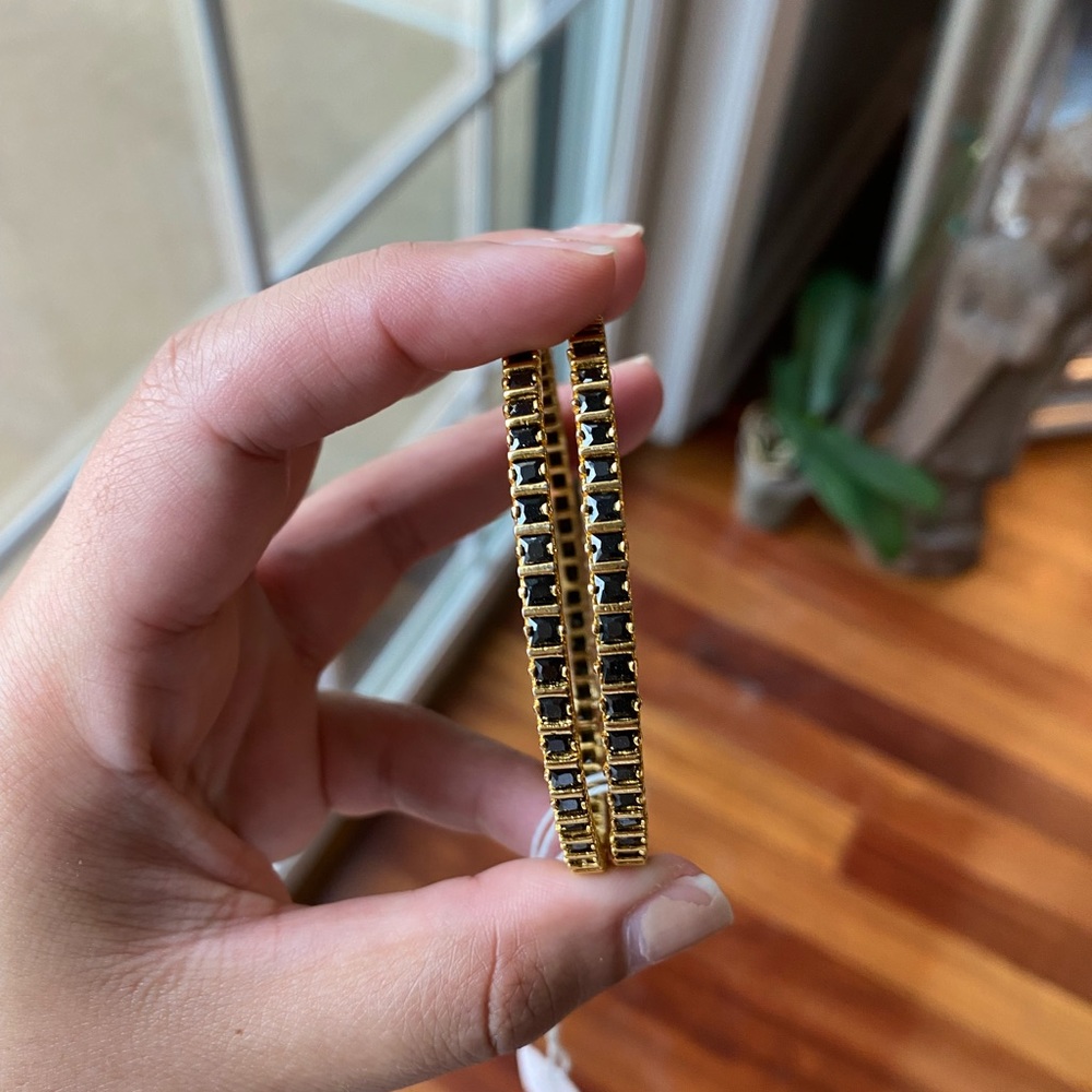 Black stone and gold plated bangle